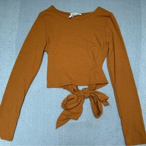 Long sleeve crop top, open/tie back